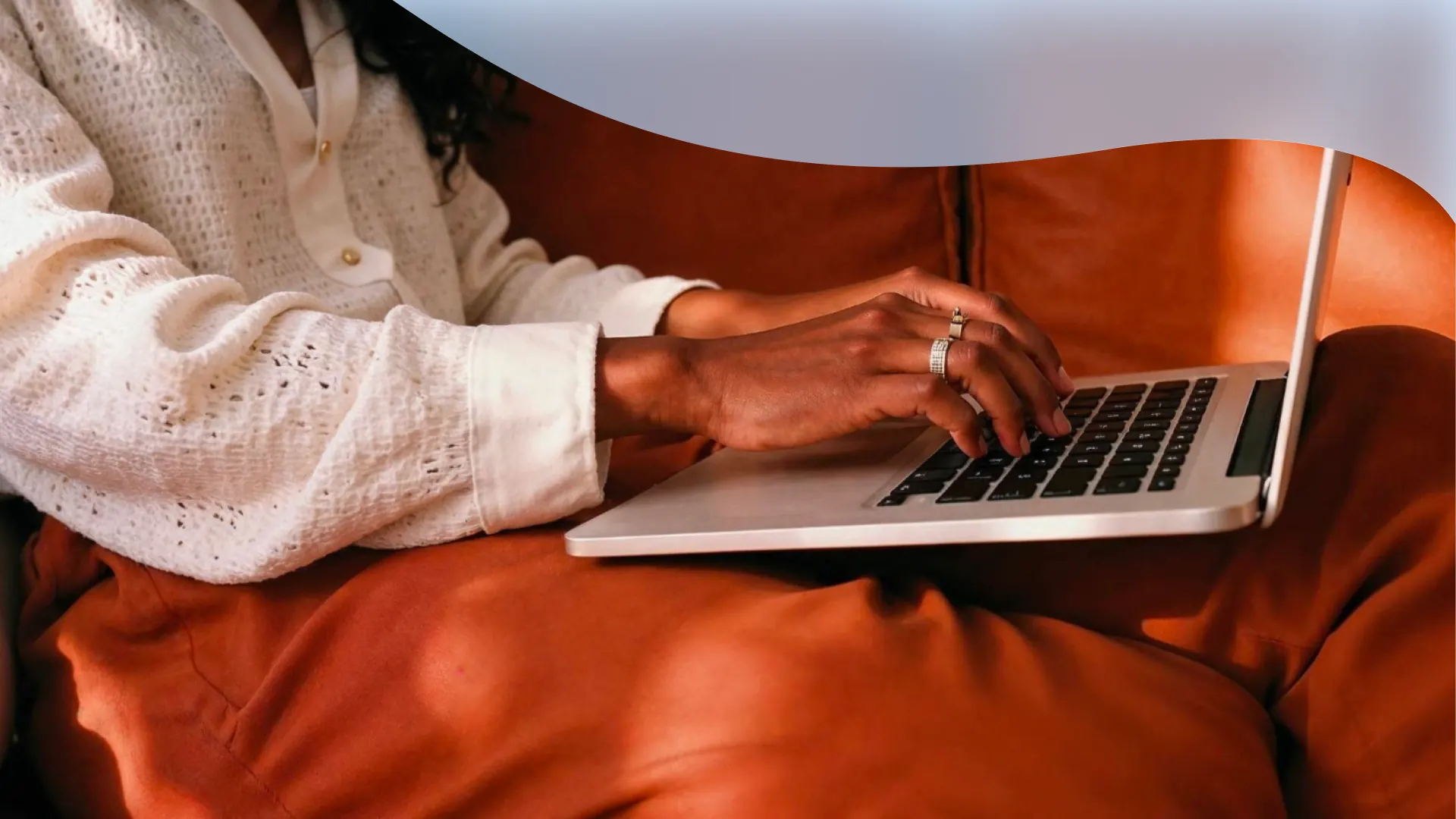 Woman booking a house cleaning from her phone at home in New York